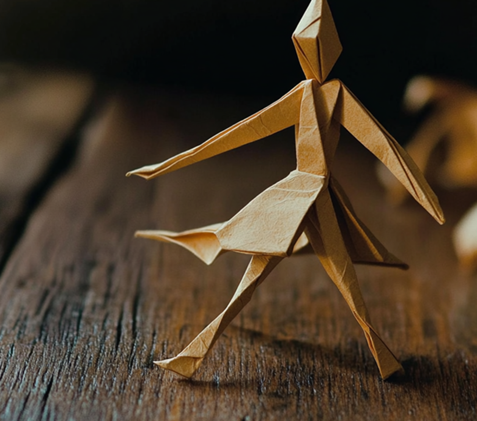 Create an origami figure standing on a desk modeled